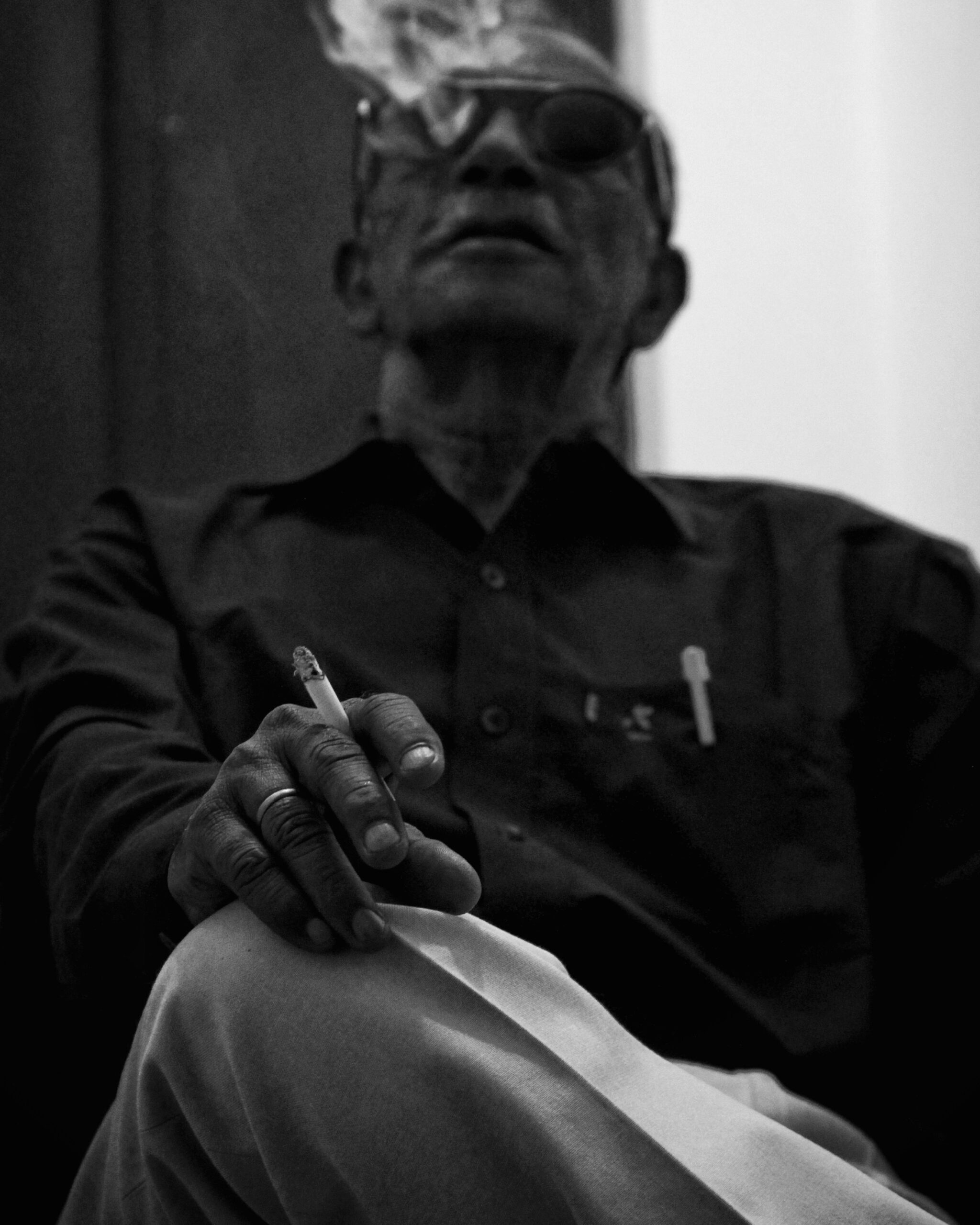 A old man smoking