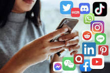 A woman using mobile phone and using different social media apps